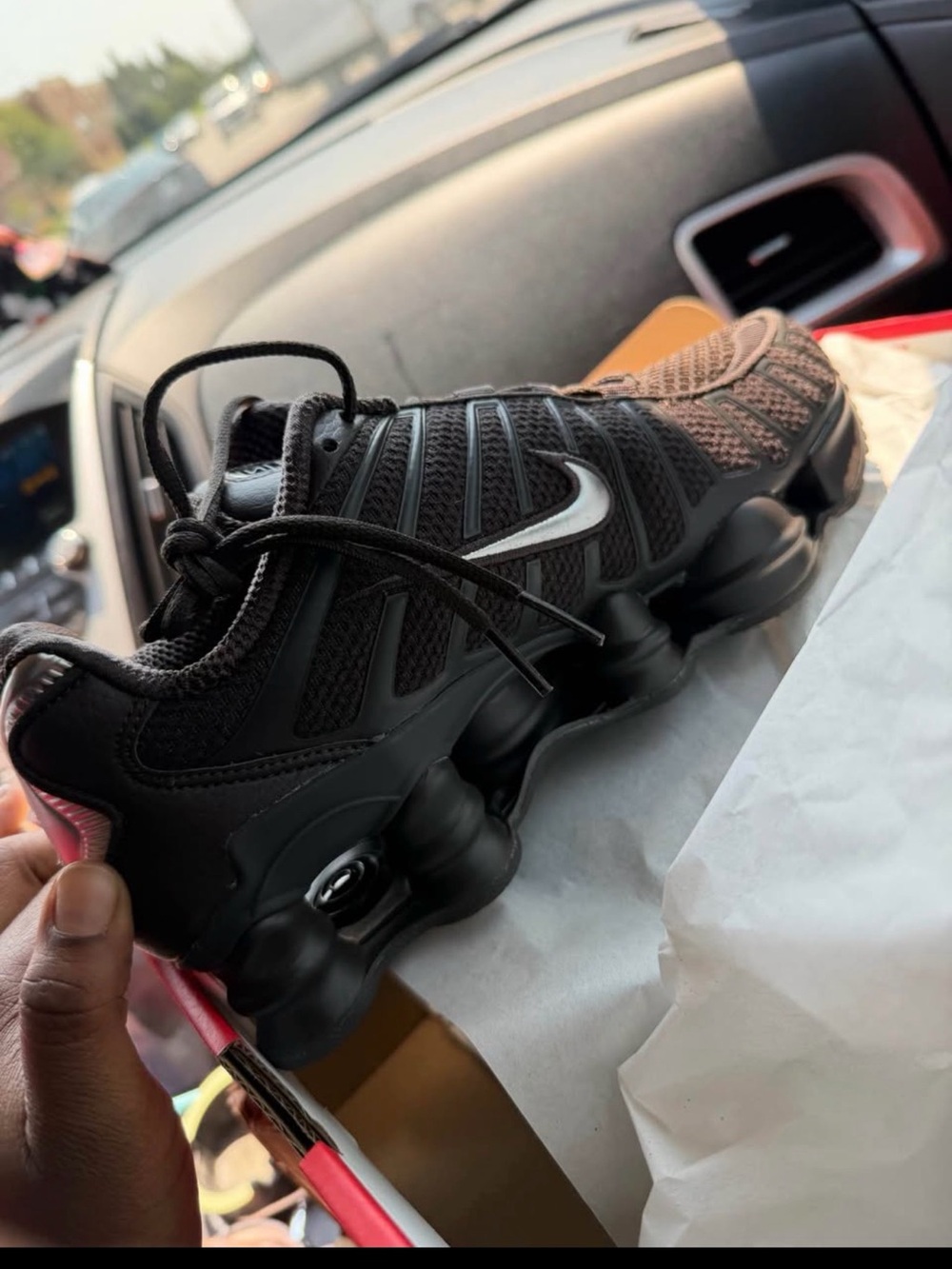 Nike Men’s Black Sneakers with White Swoosh and Pink Heel Accent